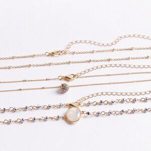 Torrid set of 3 gold tone chokers with charms